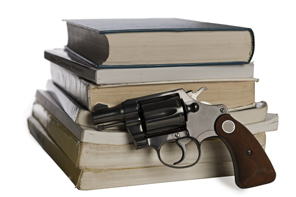 Textbooks and pistol