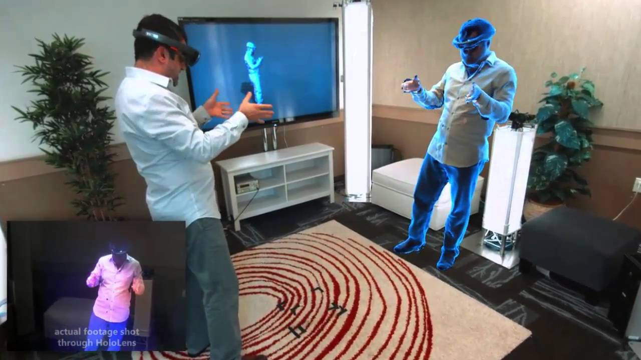 A Microsoft employee is seen viewing a 3D version of himself in real-time thanks to holoportation. The box on the bottom left shows what he sees, while the child’s actual physical location is seen in the top left box. Photo Credit: YouTube