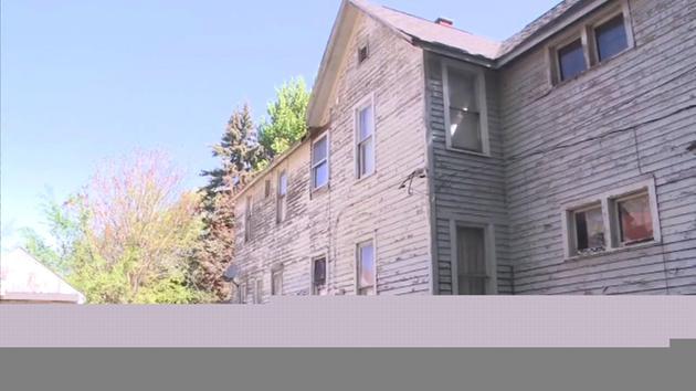 A teenager who said she was punished by being chained and forced to sleep in a darkened basement at different times over the past year used a spare key to escape Wednesday night, police said. A father and his adult son were arrested early Thursday, not long after the 13-year-old girl was found outside a downtown office building more than a mile away. Timothy Ciboro, 53, and Esten Ciboro, 27, were charged with kidnapping and child endangerment and were being held on bond. Officers said it appeared the two men were trying to flee when they arrived at the house. Both were pulling away in a van with two younger children, a dog and cat, a map and a gun, according to a police report. Both asked for a public defender during a brief hearing Thursday. A message was left with the public defender's office. It's not clear how long the girl may have been in the basement. She told investigators she was shackled by the ankle to a support beam in the darkened room for different periods of time, and as long as a year, according to a court document. The girl, who is related to the men, told officers she was shackled after wetting the bed. She said she hid a key in the basement that she used to escape when the men went jogging Wednesday night. Officers found leg irons in the basement along with a bucket the girl said she used as a toilet, according to a police report. The head of Lucas County Children Services said the girl was found with poor hygiene, but the two other children who also lived in the house appeared to be OK. "They were not victims, to my knowledge," said Robin Reese, the agency's executive director. The agency had contact with the girl in 2014, but she did not show signs of being malnourished or mistreated and was never removed from the home, she said. The girl was home-schooled, Reese said. All three children were placed in foster care Thursday. Information about the girl's mother wasn't immediately known.