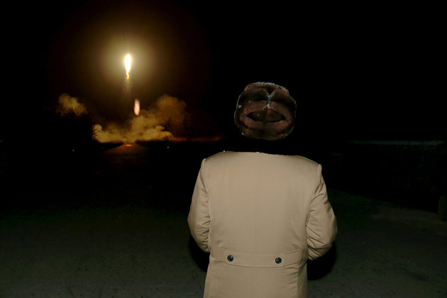 FILE PHOTO: North Korean leader Kim Jong Un watches the ballistic rocket launch drill of the Strategic Force of the Korean People's Army (KPA) at an unknown location, in this undated file photo released by North Korea's Korean Central News Agency (KCNA) in Pyongyang on March 11, 2016. KCNA/ via REUTERS/File Photo.