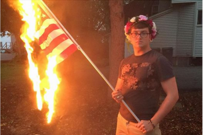 An Illinois man, Bryton Mellott, was arrested for posting pictures of himself burning an American flag on the Fourth of July weekend. Photo Credit: Facebook