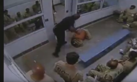 guard beats up inmate