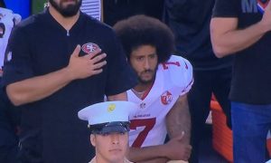 Kaepernick Sitting during national anthem