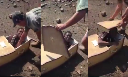 White Men Forcefully Puts A Black Man In Coffin With Plans Of Burrying Him Alive